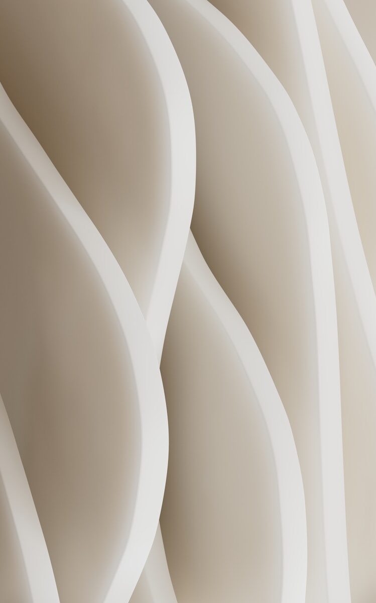 Curved, abstract architecture in shades of beige.